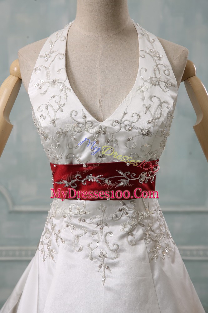 Dramatic White Halter Top Neckline Beading and Embroidery Wedding Gowns Sleeveless Lace Up