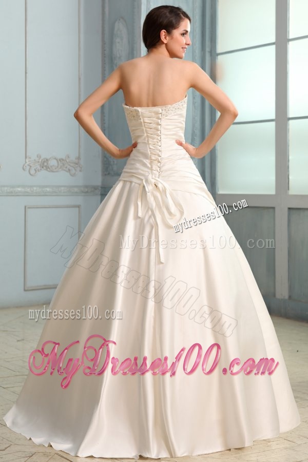 A-Line Strapless Floor-length Beading Lace Up Wedding Dress in Champagne