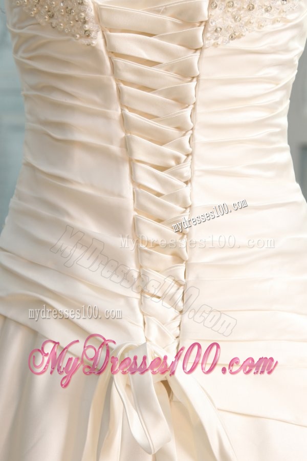 A-Line Strapless Floor-length Beading Lace Up Wedding Dress in Champagne