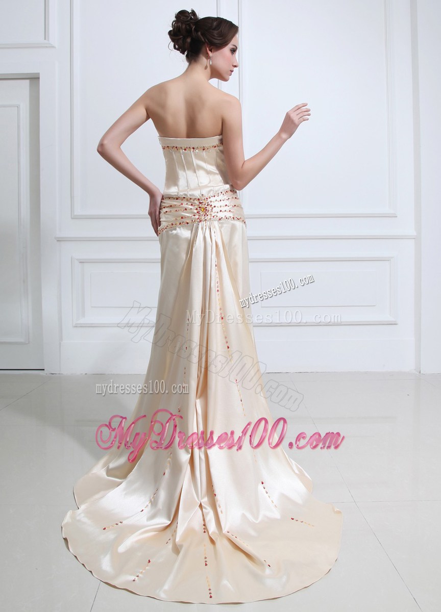 Elegant Brush Train Champagne Prom Dress with Red Beading and High Slit